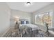 Inviting bedroom featuring plush carpet, soft lighting, and serene decor, great for relaxation at 1104 Fanning Dr, Wake Forest, NC 27587