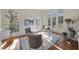 Bright and airy office space with hardwood floors and large windows, creating an ideal work environment at 1104 Fanning Dr, Wake Forest, NC 27587