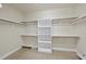 Spacious walk-in closet offering ample shelving and storage solutions at 1104 Fanning Dr, Wake Forest, NC 27587