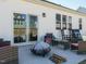 Outdoor patio features a fire pit, comfortable seating, and a sliding glass door to the interior at 120 Wise Oak Ln, Garner, NC 27529