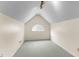 Carpeted attic space with light beige walls and one window at 1217 Hillingdon Way, Raleigh, NC 27614