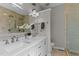 Bathroom featuring double sinks, a mirror, and decorative accents at 1217 Hillingdon Way, Raleigh, NC 27614