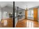 Bright living room boasts a cozy fireplace, hardwood floors and high ceilings at 1217 Hillingdon Way, Raleigh, NC 27614