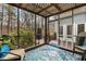 Relaxing screened porch with wooded views, lattice ceiling and indoor/outdoor living at 1217 Hillingdon Way, Raleigh, NC 27614