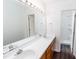 Bathroom featuring double sinks, a large mirror, and shower at 12491 Buffalo Rd, Archer Lodge, NC 27527