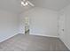 Empty bedroom featuring neutral-toned walls and carpeting at 20 Beechnut Ct, Franklinton, NC 27525