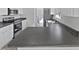 Well-lit kitchen with stone countertops and stainless steel appliances at 20 Beechnut Ct, Franklinton, NC 27525