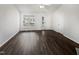 Open living space with vaulted ceilings and luxury vinyl flooring, creating a bright and spacious atmosphere at 20 Beechnut Ct, Franklinton, NC 27525