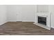 Open-concept living room featuring a faux fireplace with marble accents at 20 Beechnut Ct, Franklinton, NC 27525