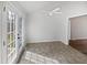 Sun room with tiled floors and exterior access to the back yard at 20 Beechnut Ct, Franklinton, NC 27525