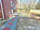 Newly constructed back patio with stone walkway, providing a perfect outdoor living space at 201 W Thorndale Dr, Oxford, NC 27565