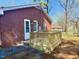 Newly constructed wooden deck that offers outdoor relaxation and entertainment space at 201 W Thorndale Dr, Oxford, NC 27565