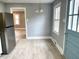 Kitchen area featuring gray painted walls and modern appliances at 201 W Thorndale Dr, Oxford, NC 27565