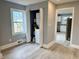 Convenient laundry closet with stacked washer and dryer, and a water heater at 201 W Thorndale Dr, Oxford, NC 27565