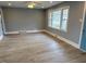 Bright and spacious living room featuring hardwood floors and plenty of natural light at 201 W Thorndale Dr, Oxford, NC 27565