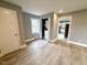 Bedroom featuring hardwood floors, gray walls and closet at 201 W Thorndale Dr, Oxford, NC 27565