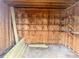 Empty shed interior with wooden walls and flooring, ready for storage or workshop use at 201 W Thorndale Dr, Oxford, NC 27565