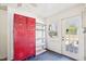 Bright laundry room features a set of red lockers at 202 W Lavender Ave, Durham, NC 27704