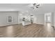 Open concept floor plan with wood floors and a modern kitchen at 203 Jetson Creek Way, Youngsville, NC 27596