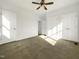 This bedroom features neutral walls, carpeted floors, and a ceiling fan at 265 Freeman Pines Pl, Fuquay Varina, NC 27526