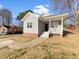 Charming single-Gathering home with a well-manicured lawn and a welcoming front porch at 265 Freeman Pines Pl, Fuquay Varina, NC 27526