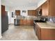 Traditional kitchen featuring stainless steel appliances and plenty of cabinet space at 265 Freeman Pines Pl, Fuquay Varina, NC 27526