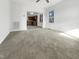Open floor plan living room leading into the kitchen at 265 Freeman Pines Pl, Fuquay Varina, NC 27526