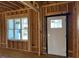 Framed entryway with a window and exterior door at 28 Golden View Pl, Zebulon, NC 27597