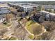 Aerial view of community featuring a park, apartment buildings, and convenient street access at 300 Finsbury St # 313, Durham, NC 27703