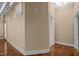 Hallway features hardwood floors, neutral walls, and entryways into other rooms at 300 Finsbury St # 313, Durham, NC 27703