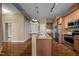 Open kitchen features granite counters, stainless appliances, breakfast bar, and easy access to living spaces at 300 Finsbury St # 313, Durham, NC 27703