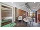 Lobby area features an elevator, seating, and modern decor at 300 Finsbury St # 313, Durham, NC 27703