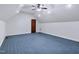 Finished attic space with blue flooring and recessed lighting creates a versatile room for activities at 309 Shoreline Dr, Princeton, NC 27569
