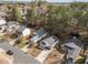 Birds-eye view of a residential neighborhood with sidewalks, manicured lawns and tree lined streets on a sunny day at 312 Homestead Park Dr, Apex, NC 27502