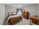 Cozy bedroom featuring a ceiling fan, neutral walls, and plenty of natural light from the window at 312 Homestead Park Dr, Apex, NC 27502