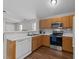 Functional kitchen featuring a clean design with modern appliances and ample counter space at 312 Homestead Park Dr, Apex, NC 27502