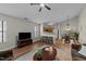 Spacious living room with breakfast bar leading to kitchen and dining area with plenty of light at 312 Homestead Park Dr, Apex, NC 27502