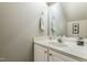 Neutral bathroom features a single sink vanity and large mirror at 3122 Coxindale Dr, Raleigh, NC 27615