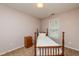 Cozy bedroom with natural light and neutral carpet at 3122 Coxindale Dr, Raleigh, NC 27615