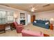 Comfortable living room with a fireplace, large window, and carpeted floor provides an inviting space at 3122 Coxindale Dr, Raleigh, NC 27615