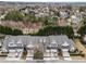 Aerial view of townhomes showcasing well-maintained landscaping and neighborhood layout at 3124 Elm Tree Ln, Raleigh, NC 27614