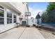 Small backyard featuring a basketball hoop, trampoline, and patio area at 3124 Elm Tree Ln, Raleigh, NC 27614