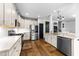 Well-equipped kitchen featuring stainless steel appliances, ample counter space, and hardwood floors at 3124 Elm Tree Ln, Raleigh, NC 27614
