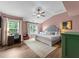 Spacious main bedroom features vaulted ceiling, natural light and ample space for a desk at 3124 Elm Tree Ln, Raleigh, NC 27614