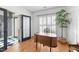 Bright office space with hardwood floors, designer wall accents, and a stylish work area at 3124 Elm Tree Ln, Raleigh, NC 27614