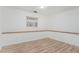 Inviting bedroom features wood-look floors, neutral tones, and fresh paint at 325 Bainbridge Cir, Garner, NC 27529