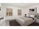 Cozy bedroom with carpet, natural light, and contemporary design for restful nights at 325 Bainbridge Cir, Garner, NC 27529