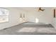 Spacious living room with a ceiling fan and access to an outdoor deck at 325 Bainbridge Cir, Garner, NC 27529
