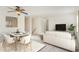Open-concept living and dining area with neutral tones and plenty of natural light at 325 Bainbridge Cir, Garner, NC 27529