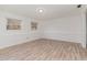 Bright and spacious room with clean lines and laminate flooring at 325 Bainbridge Cir, Garner, NC 27529